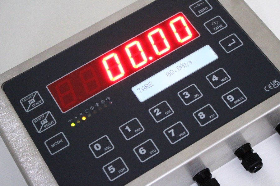 Close-up of the EXCELSIOR red LED display, backlit LCD and keypad