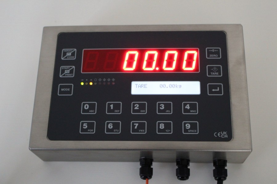 EXCELSIOR digital weigh terminal, front view, showing the display, keypad and three cable glands