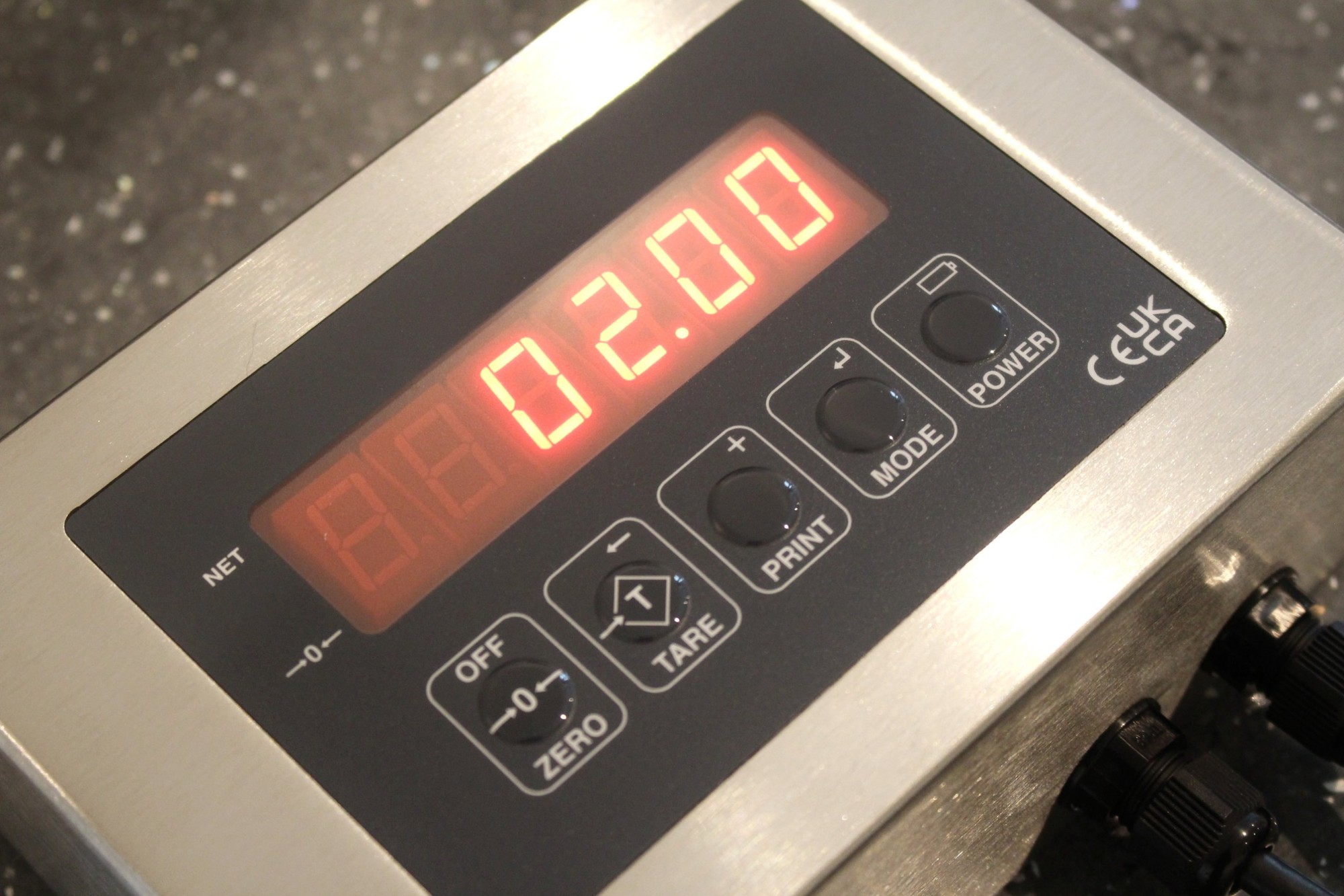 Close-up of the JUNIOR 6-digit red LED display and keypad